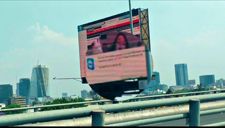 Hackin - Someone hacked this billboard in Mexico and defaced with porn video